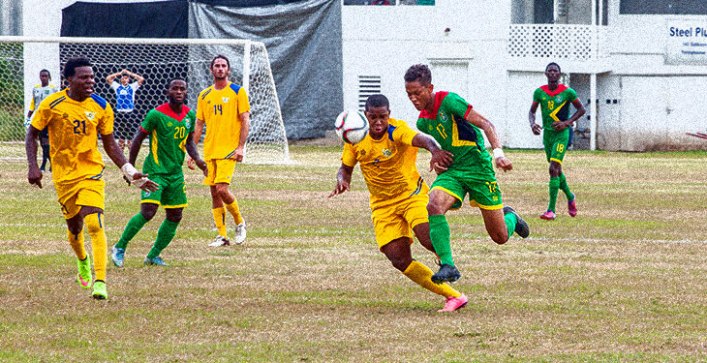 A football game being played in the fields of French Guiana